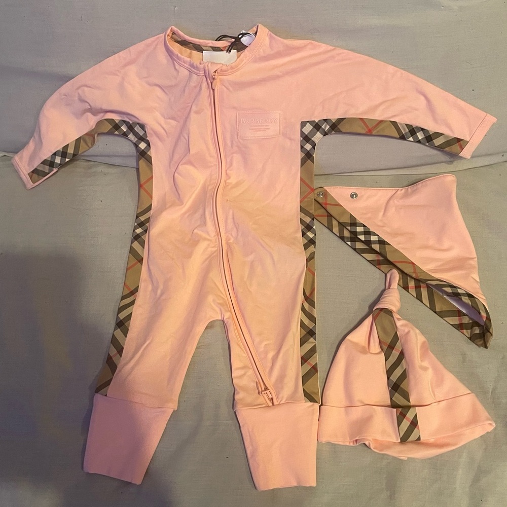 Burberry Pink w/ Signature Print down both sides of one piece full zippered